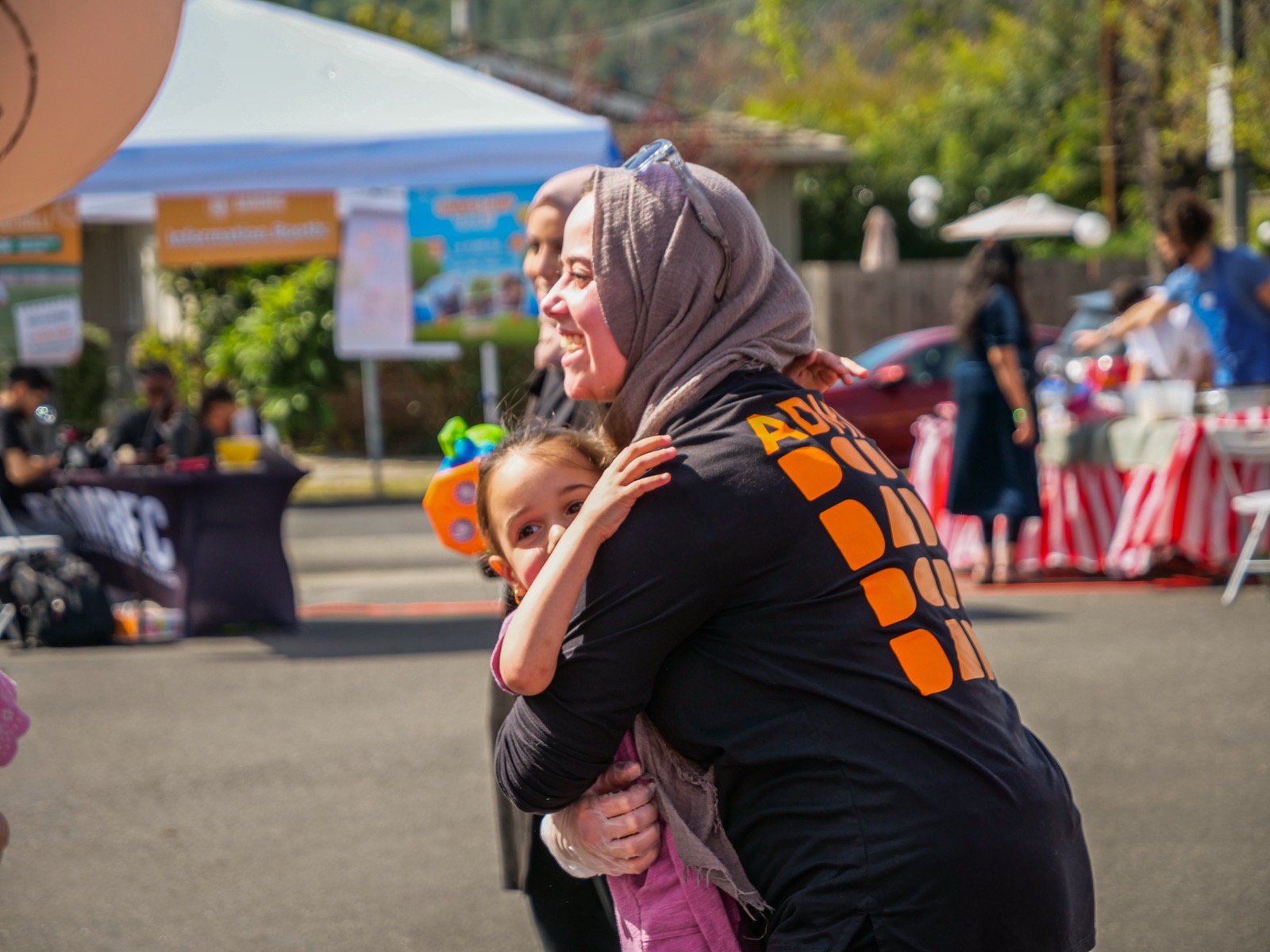 Bamrec mentors with children at an event